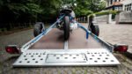 STEMA WOM 1800 STS O2 18-35-17.1 Absenkanhänger mit 1 Verzurrschiene und Reling – 100 km/h Zulassung